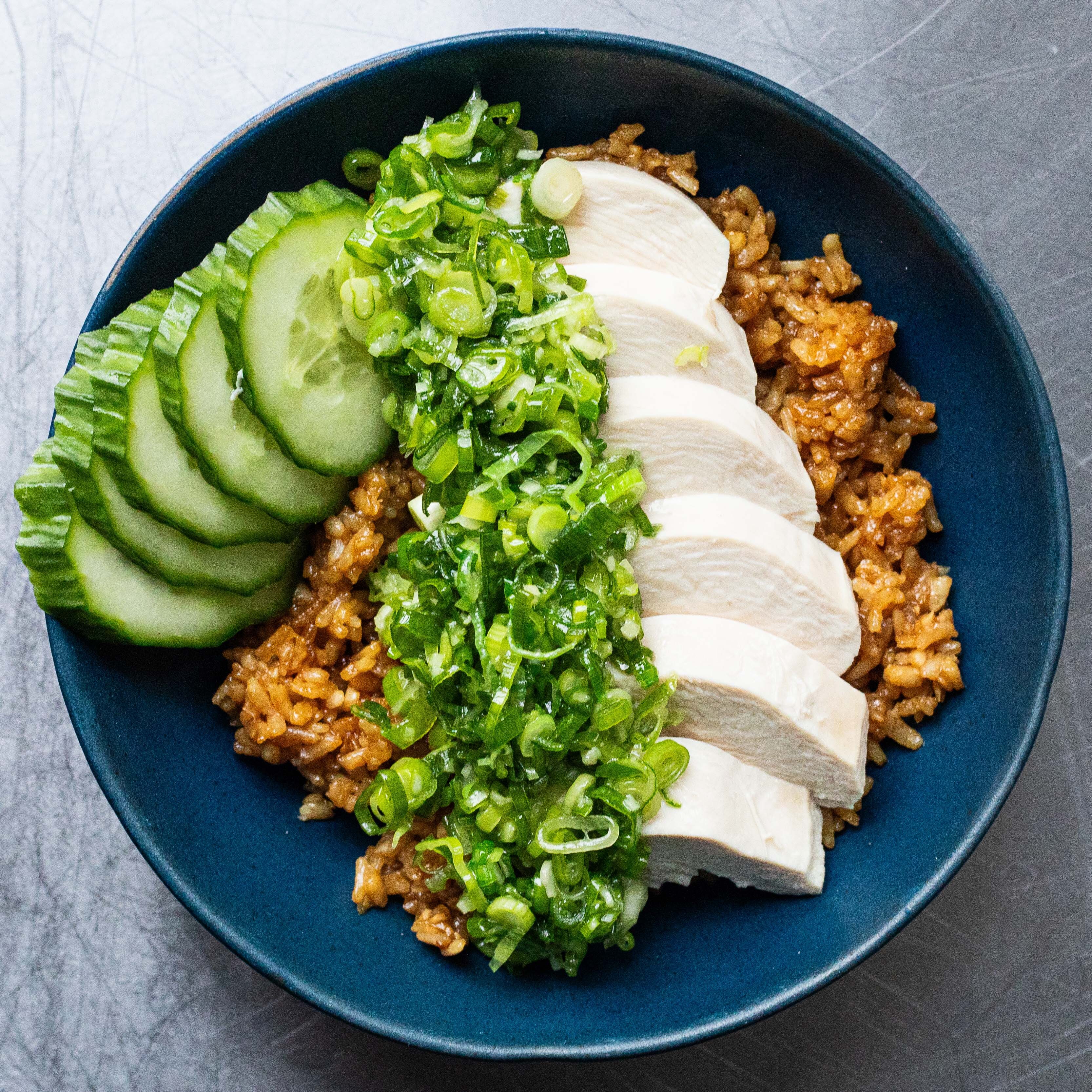 Poached Chicken, Garlic Rice & Spring Onion Sauce