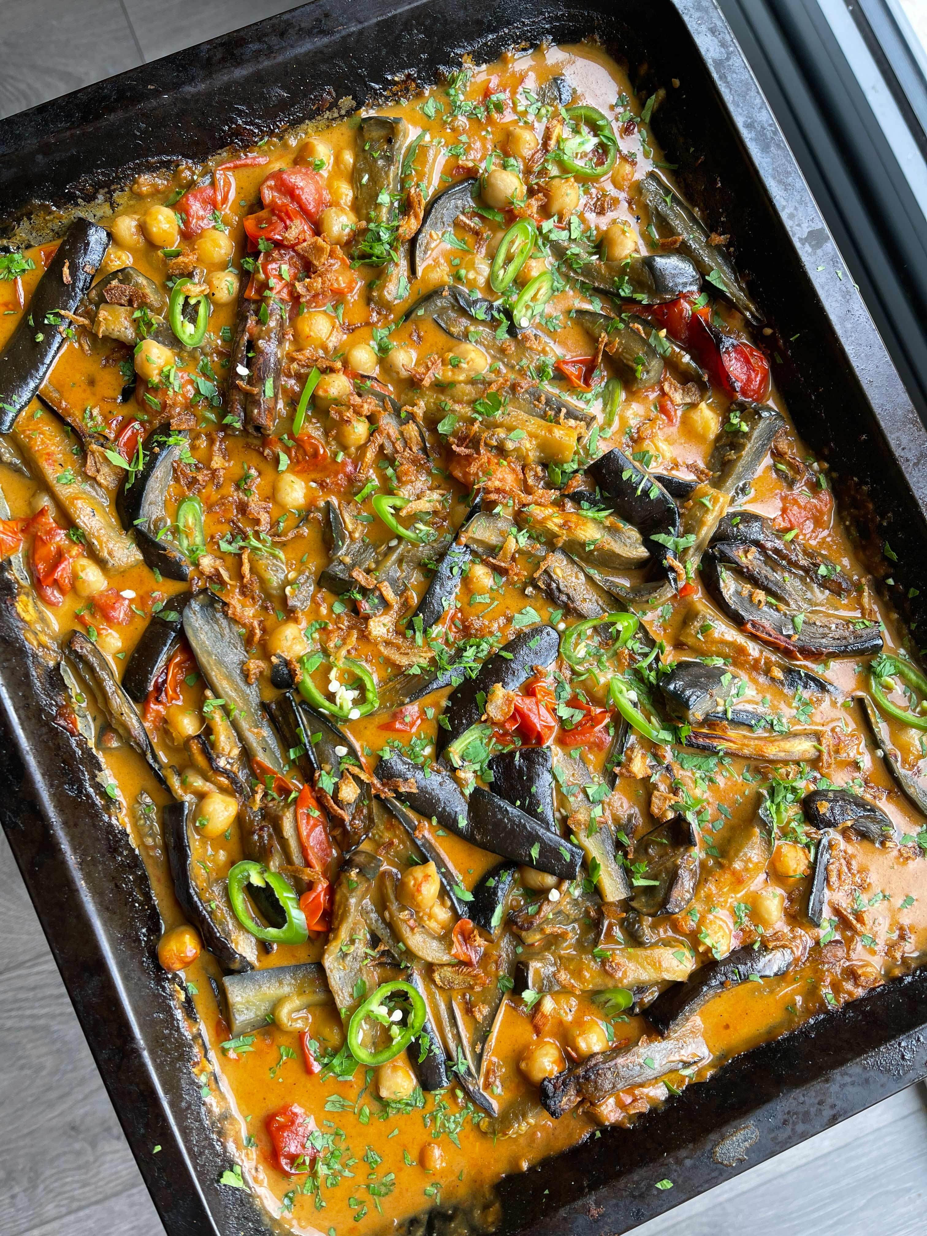 image of Aubergine and Tomato Traybake Curry recipe by Mob